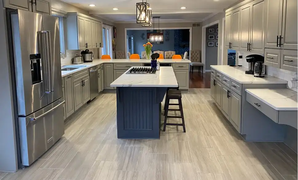 Geist kitchen with Dorian Gray cabinets, a Peppercorn island and Repose Gray walls