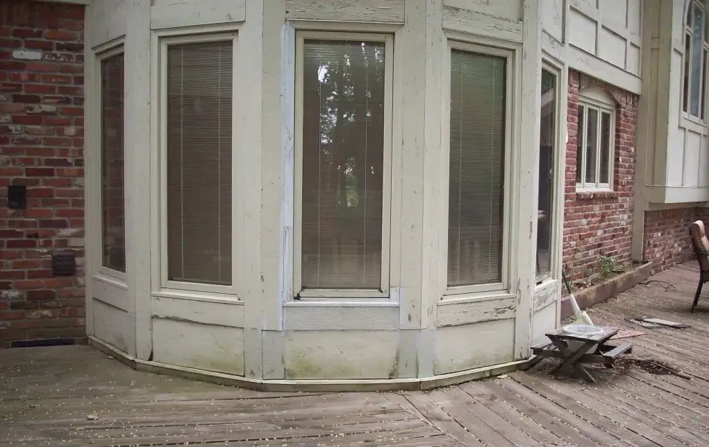 Damaged wood window sash before restoration