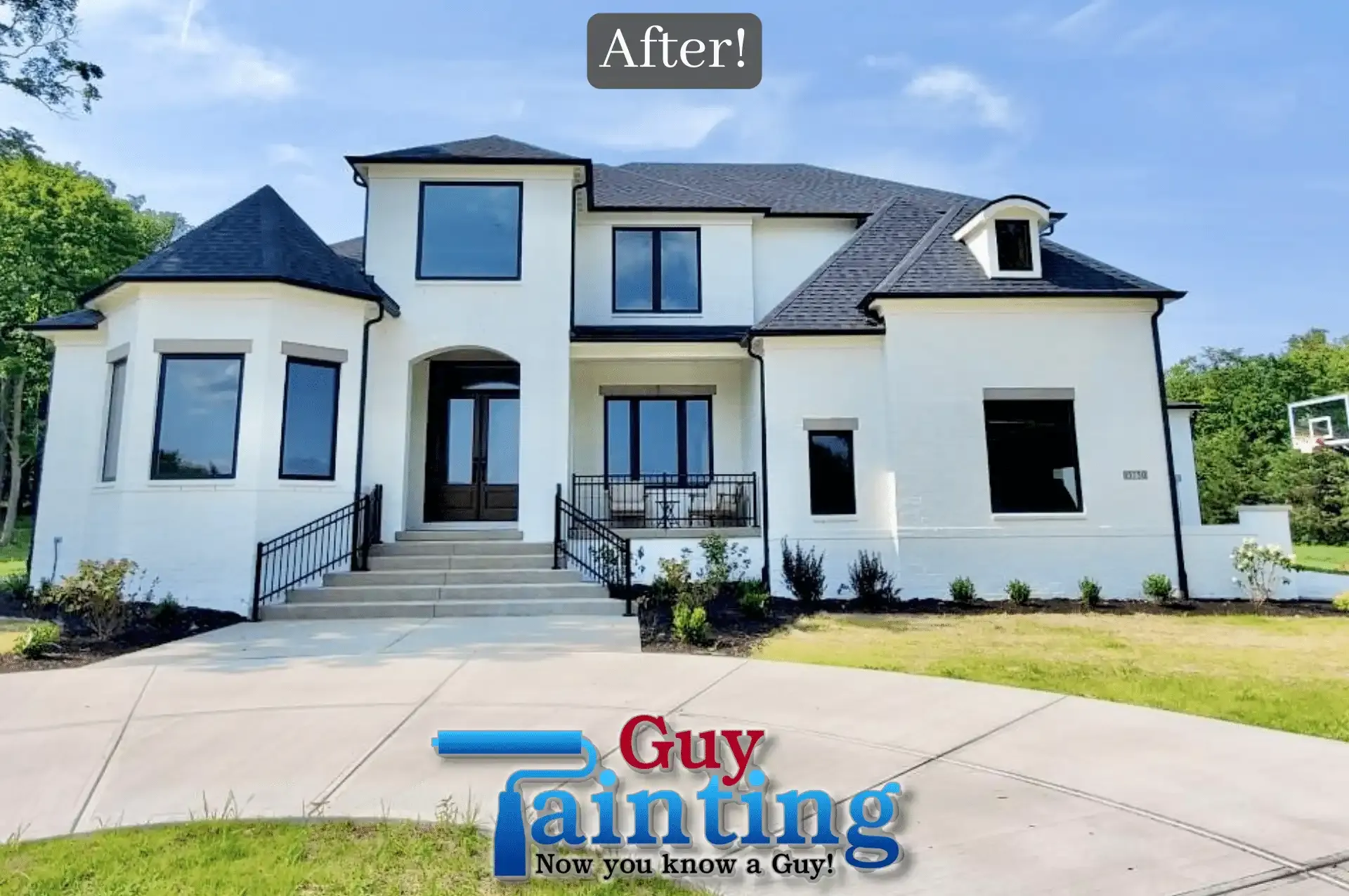 Two-story home with brick painted white and black windows, gutters and trim