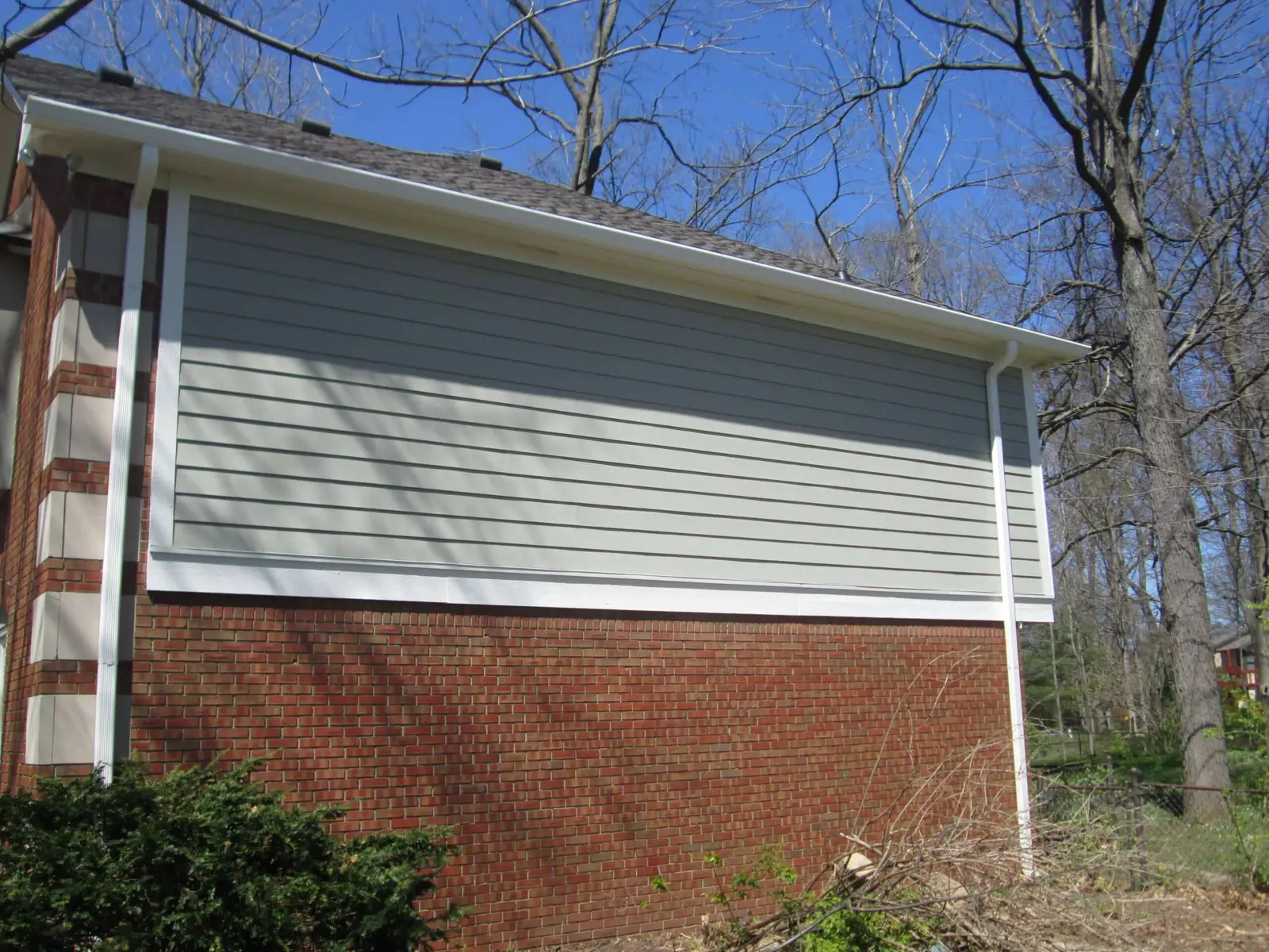 Wood and siding replacement before painting.