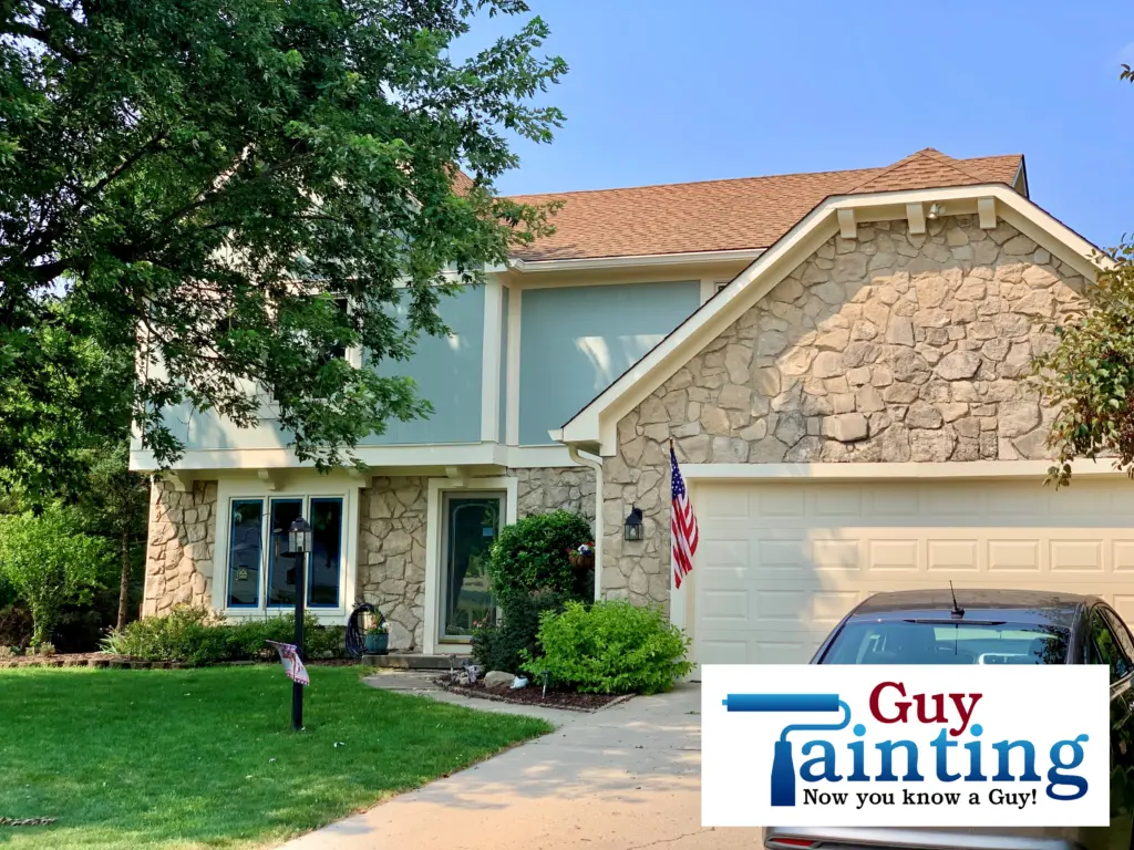 Indianapolis exterior home painting in turquoise and Escape Gray.