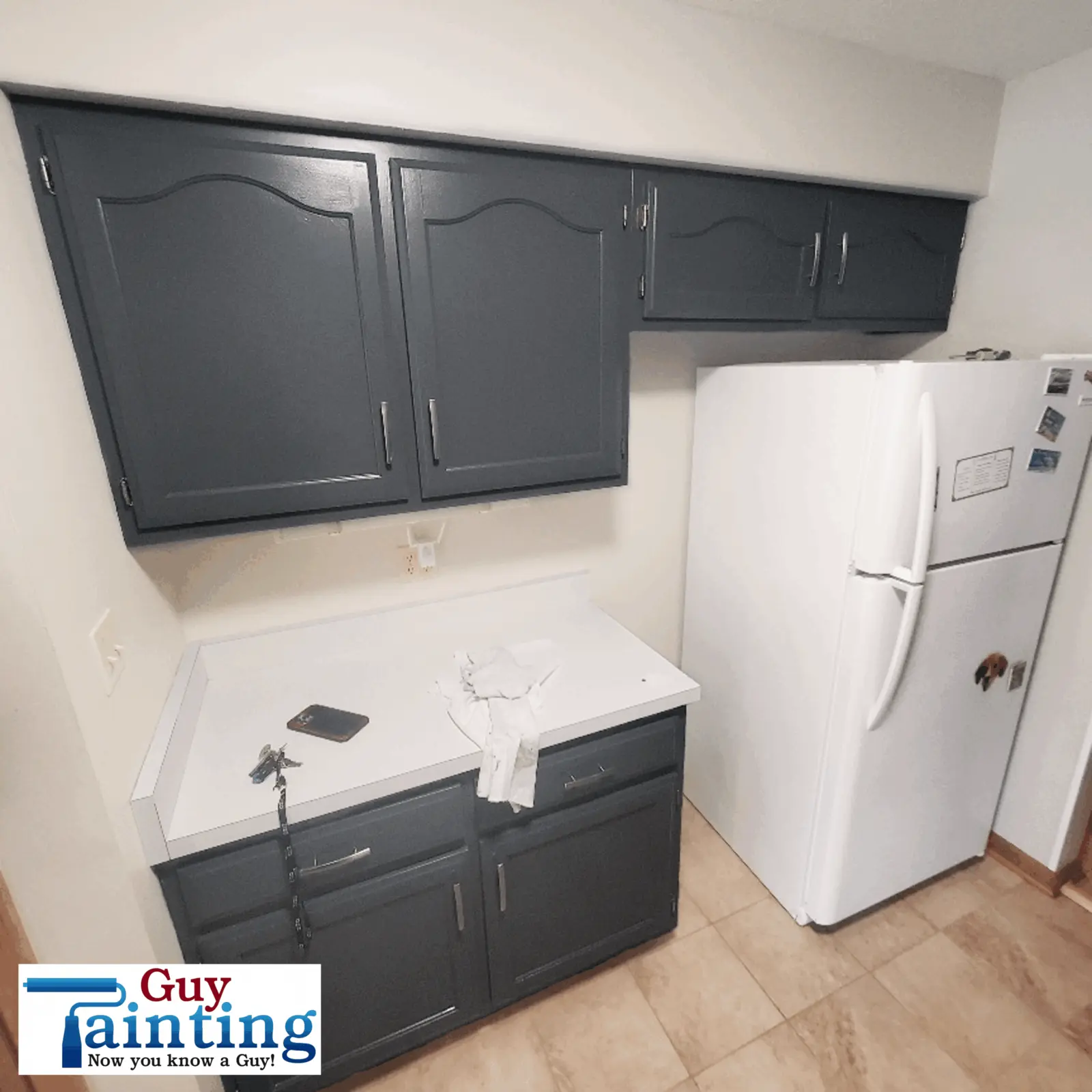Laundry cabinet painters in dark gray PPG Glazed Granite