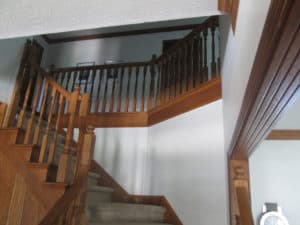 Guy Painting Wood Stairs