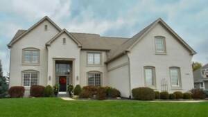 Dark gray trim with painted brick Fishers home painters Guy Painting Before